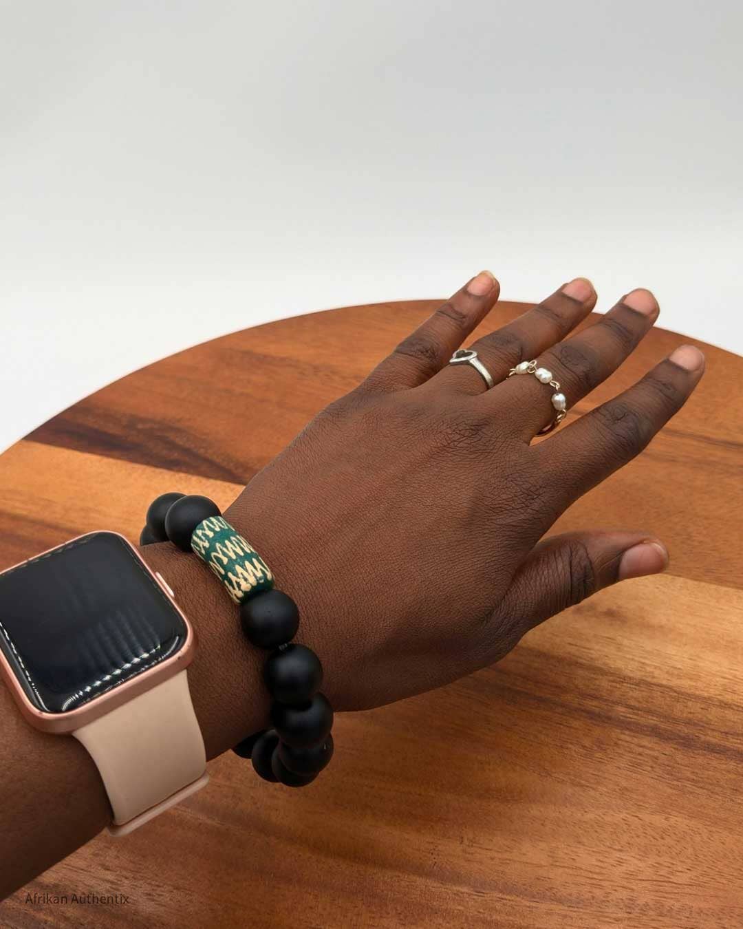 Onyx bracelet with green African bead accent men & women